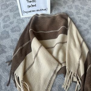 Cream and brown knit poncho. No brand. Bought at boutique.